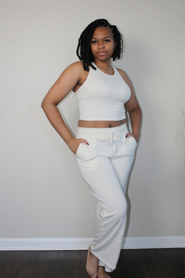 off white French Terry fabric flared sweatpants with pockets and drawstring closure and ribbed racerback tank set